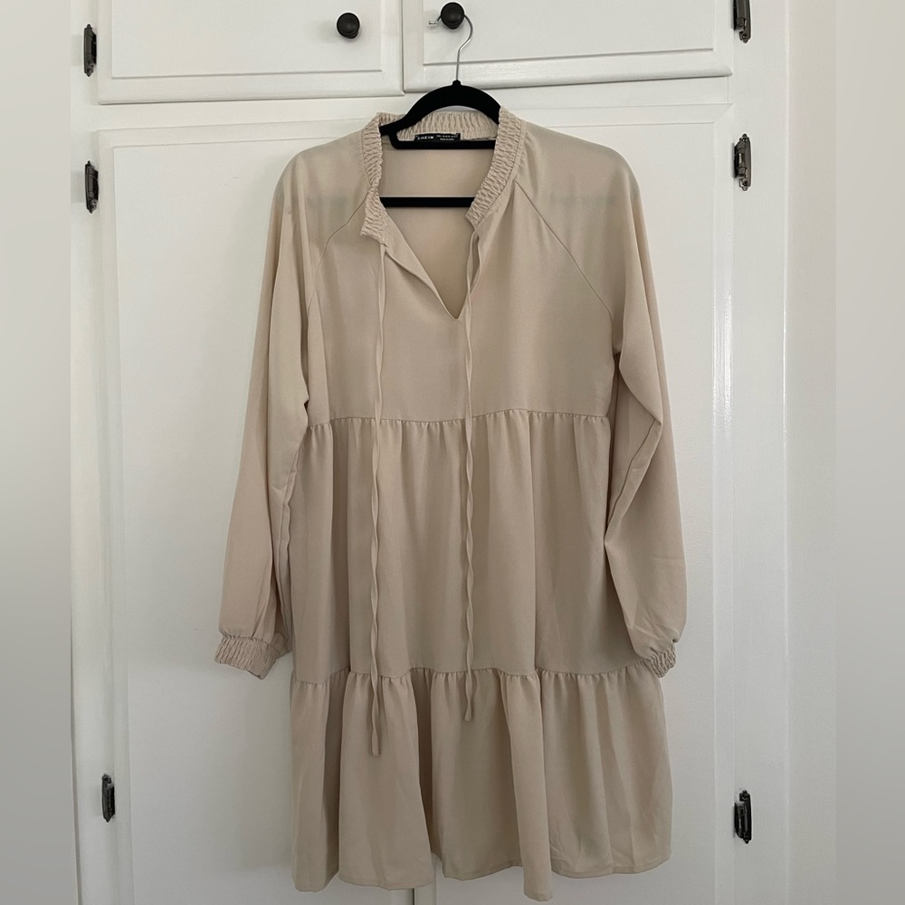 Used worn once nude dress. Size large